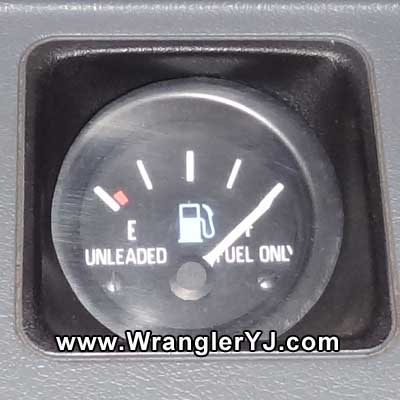 FULL tank with the engine stopped.
