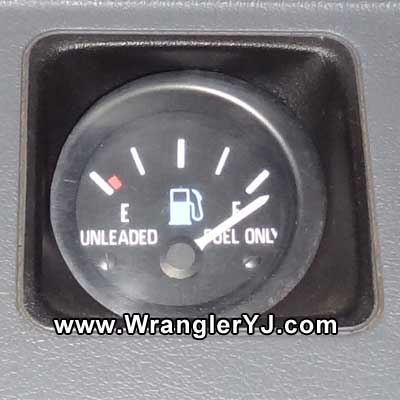 FULL tank with the engine running.